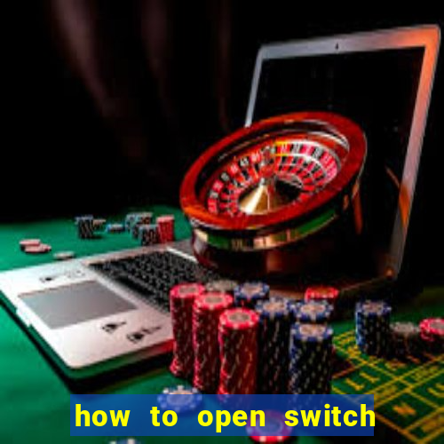 how to open switch oled game card slot