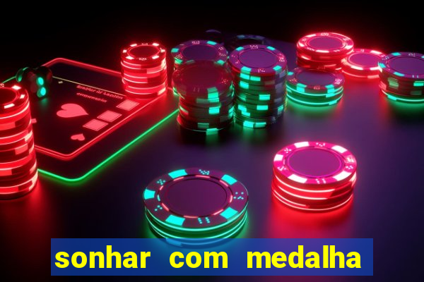 sonhar com medalha de santo